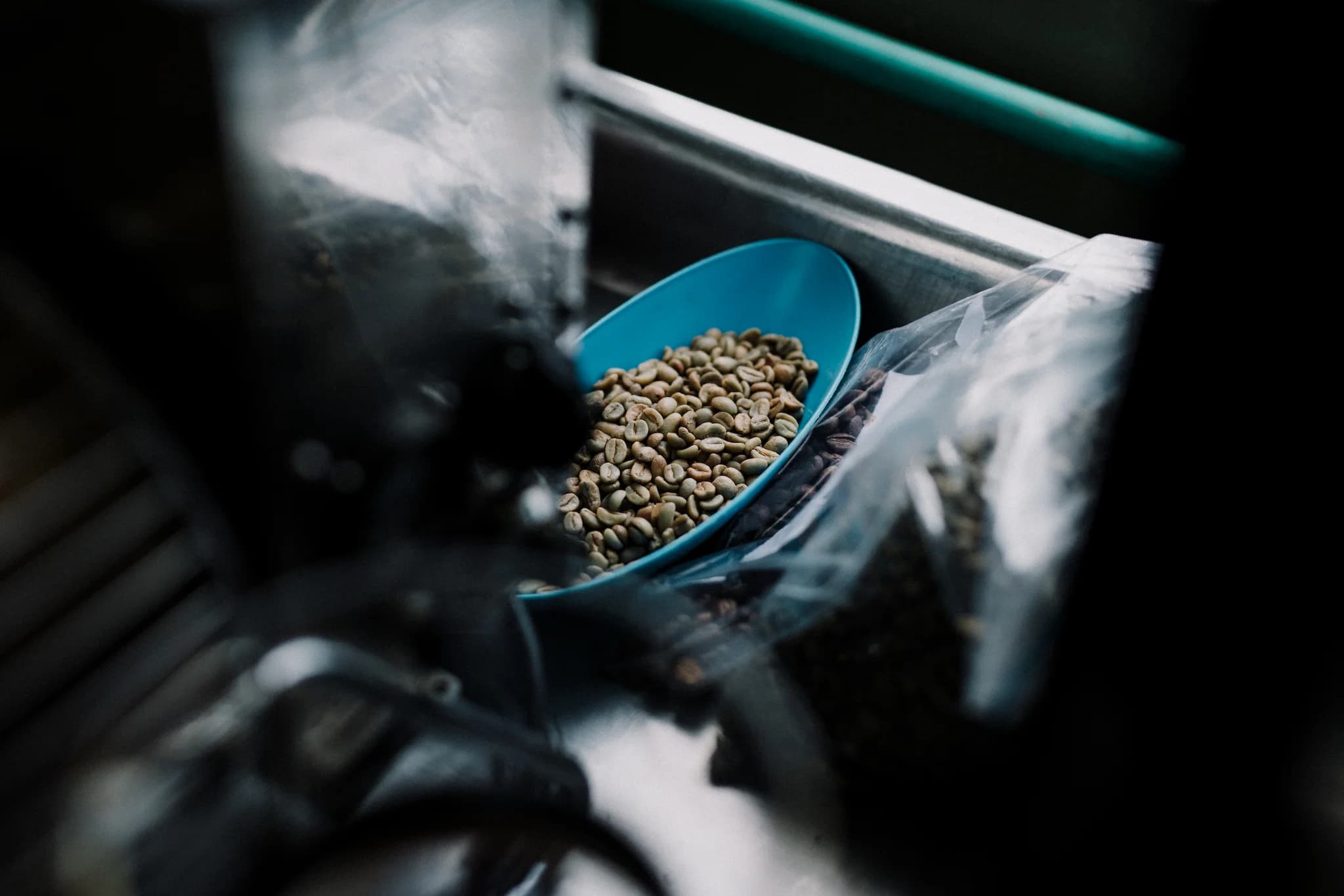 Green coffee being weighed